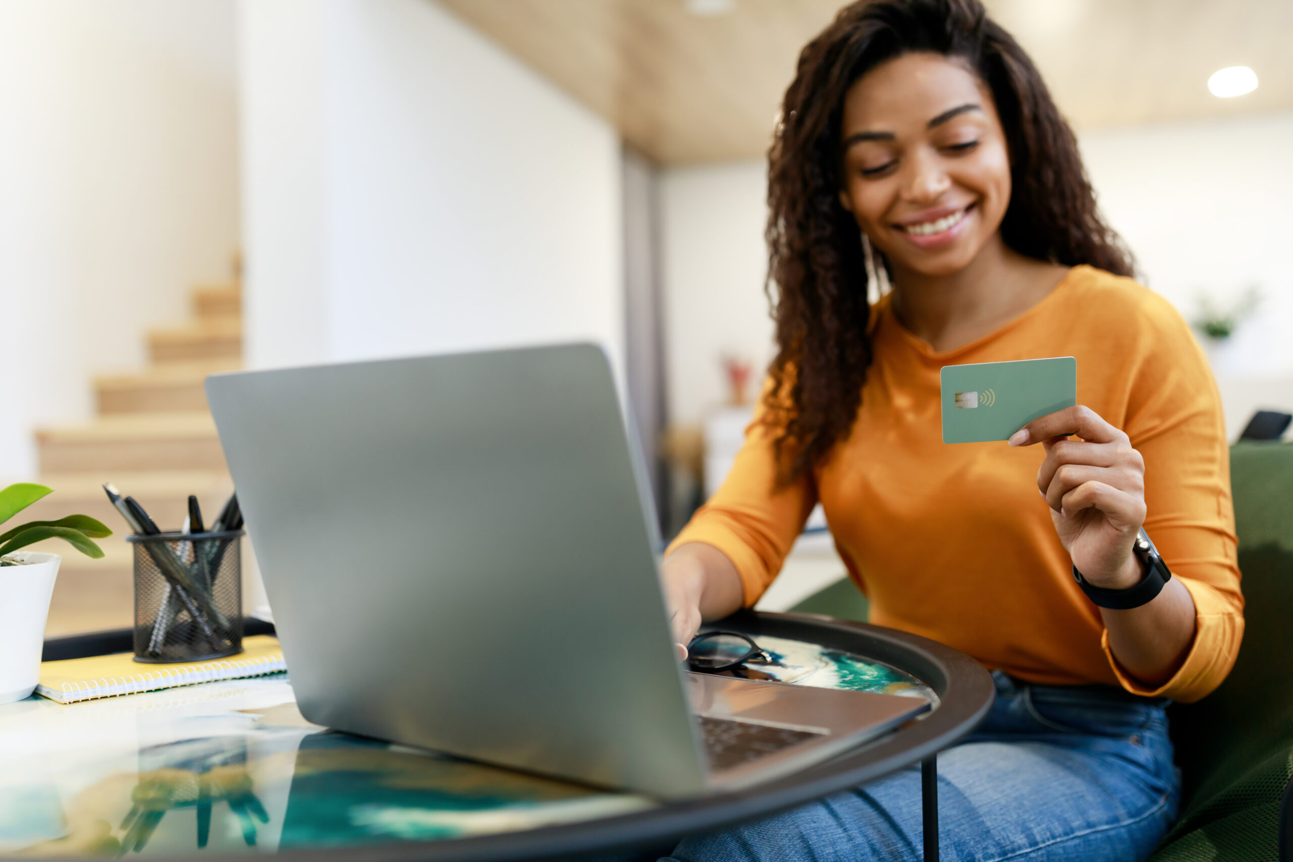 Happy user holding a card